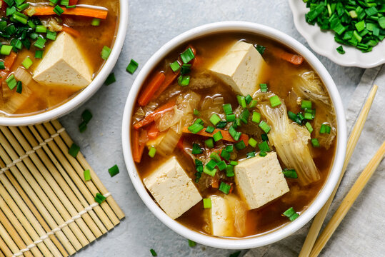 Traditional Japanese Miso Soup with Chinese Cabbage and Tofu in bowls .style hugge