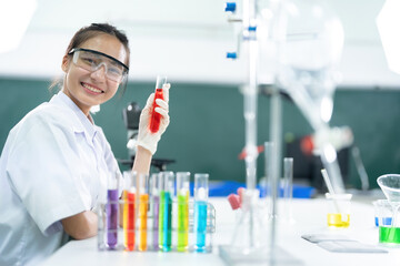 Fototapeta premium the chemistry lab, female researchers conduct experiments to identify new biomarkers and drug, advancing our understanding of disease pathways and facilitating the development of personalized medicine
