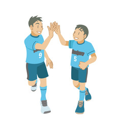 サッカーのゴールを喜び合う少年たち