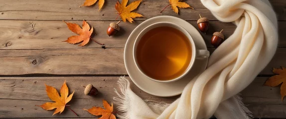 Fototapete Rund Enjoying Warm Tea and Cozy Scarf on Rustic Wooden Autumn Table. © LoFi J.