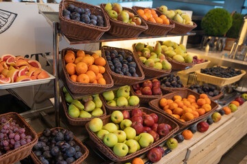 Lots of different fruits on store shelves
