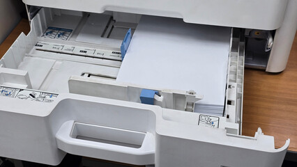 Printer tray with paper loaded and ready for printing