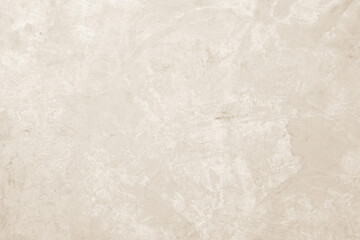 Fototapeta premium Color old concrete wall texture background. Close up retro plain cream color cement wall background texture. Design paper vintage parchment element.