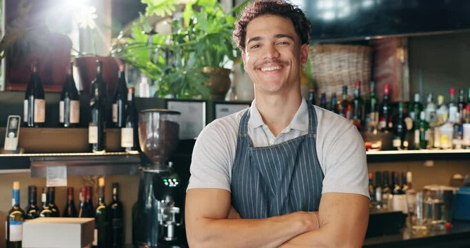 Barista, face and man with arms crossed in restaurant for customer service, laughing and career confidence. Waiter, person and happy entrepreneur in bistro for small business, hospitality and pride