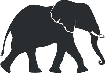 Obraz premium Silhouette of an elephant walking, showcasing its large ears and trunk in profile view.