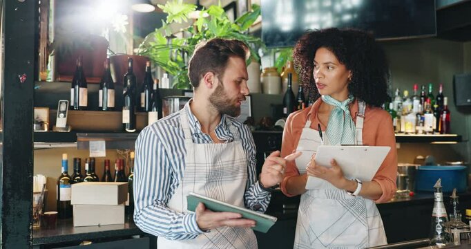 Tablet, team and checklist with people in cafe for seating plan, restaurant review and small business update. Customer experience, critic and menu rating with man and woman in coffee shop for app