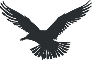 Obraz premium Silhouette of an eagle in flight with wings spread, symbolizing freedom and power.