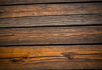 Obraz premium A close up of a wooden wall with knots.