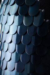 Close-up of Byzantine Lamellar Armor Scales. Detailed view of overlapping metal plates on medieval scale armor.