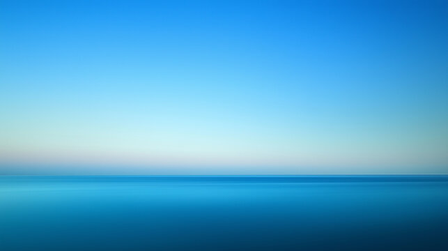 Minimalist seascape with smooth blue gradient sky at dusk