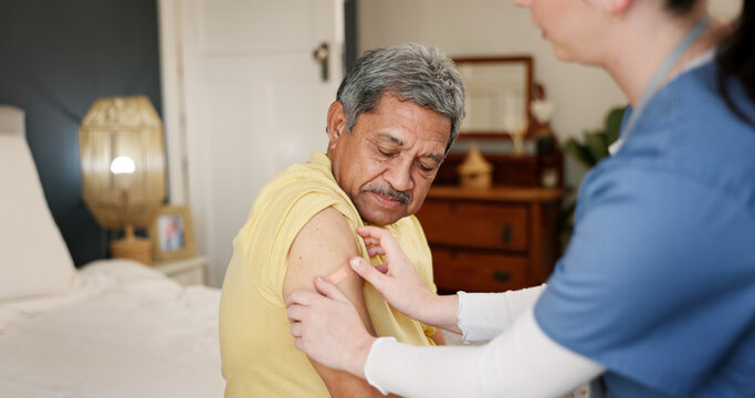 Senior man, nurse and bandage for injection, vaccine or protection from virus in bedroom. Elderly person, patient and caregiver with plaster for inoculation, wellness or healthcare in retirement home