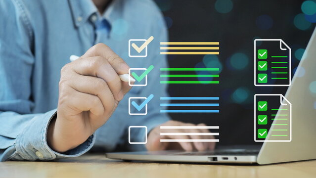 Checklist online document practices and policies concept, Businessman use tablets to check steps through policies document company articles of association Terms and Conditions, Quality inspection