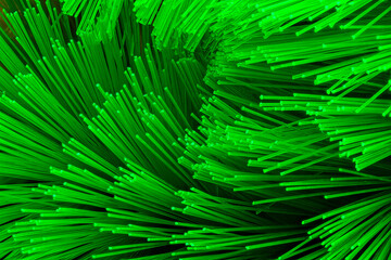 Bright and Abstract Fiber Optic Strands. Green Bristle in Close up. Neon Brush Bristles Macro Shot.