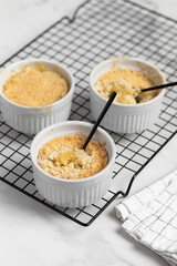 Apple crumble with streusel, light table. Morning breakfast.