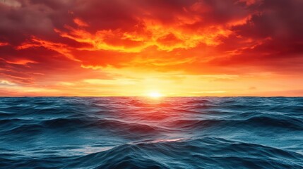 Obraz premium Sunset over the ocean scenic view with vibrant sky and dramatic dusk concept. Stunning sunset over ocean waves with vibrant colors and clouds.