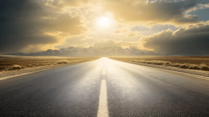Naklejka premium A striking view of a long, empty road stretching toward distant mountains under a dramatic sky.