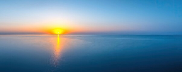 Obraz premium Sunset over the ocean scenic view with vibrant sky and dramatic dusk concept. Stunning sunset over calm water with vibrant colors reflecting.