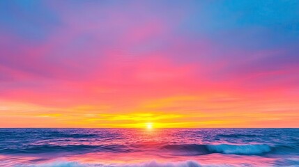 Fototapeta premium Sunset over the ocean scenic view with vibrant sky and dramatic dusk concept. A breathtaking sunset over a calm ocean with vibrant colors.