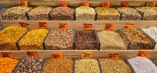 Various snacks or nuts with price tags in a snack shop in Turkey