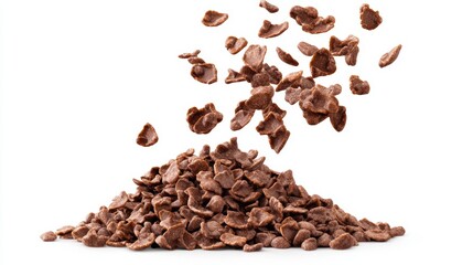 Obraz premium Dynamic Falling Chocolate Corn Flakes Displaying Glossy Texture and Crispy Edges in Midair Motion