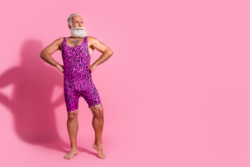 Photo of strong muscular senior man wear womens clothing accept himself isolated on pink color background