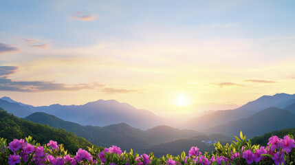 Obraz premium Breathtaking mountain landscape at sunset, featuring vibrant flowers in foreground, creating serene and peaceful atmosphere