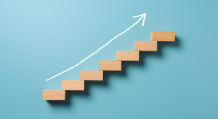 Obraz premium Wooden Blocks Arranged as Stairs with Upward Arrow on Blue Background Representing Growth and Success
