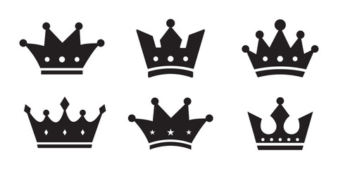 Set of three vector black silhouettes of crowns isolated on a white background. EPS 10.