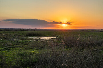 Various sunset views taken over Interstate 75 and Payne's Prairie Preserve State Park near...