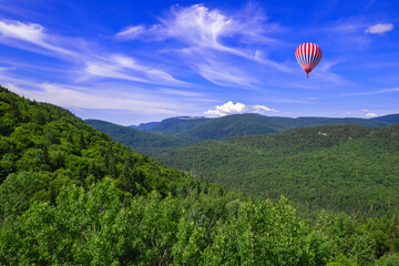 hot air balloon in the mountains
