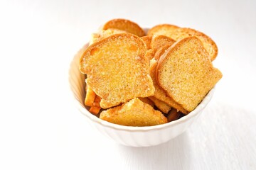 Crispy Bread Butter Sugar in white bowl on white background,Biscuits