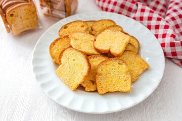 Crispy Bread Butter Sugar in white plate on white background,Biscuits