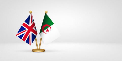 UK vs Algeria desk flags mockup 3d illustration. Versus flag of United Kingdom of Great Britain