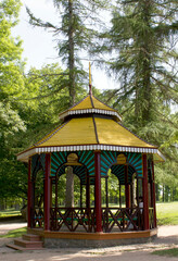 Vibrant gazebo in a green park setting