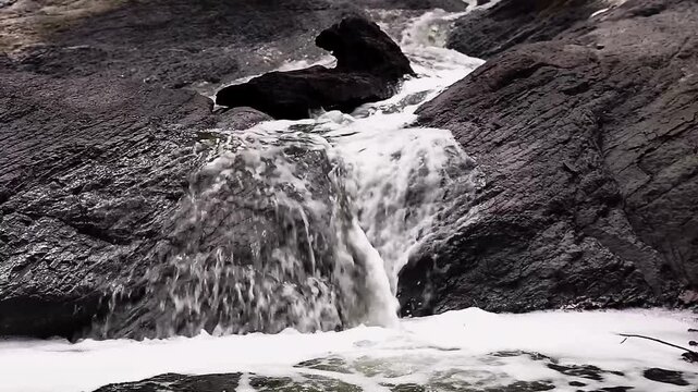 The name of this place is Kali Pait which is located in Sempol area, Ijen crater. The flowing water is sulfur water. A very beautiful place.