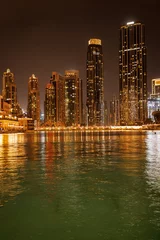 Photo sur Plexiglas Night view and night illumination of Dubai Marina skyscrapers