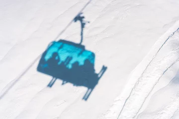  Photo of ski lift shadow on snow © Kalim
