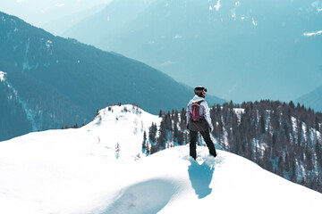 Photo of woman hike in snow on top of Spinale hill