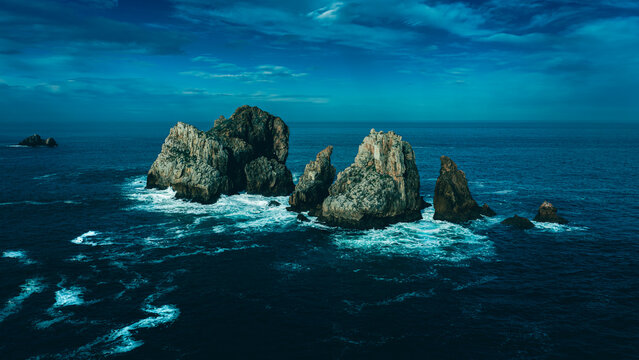 Isolated Ocean Guardians, Liencres, Cantabria, Spain