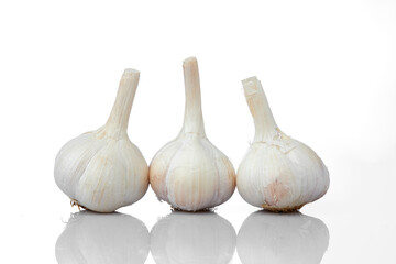 Close up Shot of Garlic Bulbs Showing Detailed Texture and Natural Features on White and Isolated Background