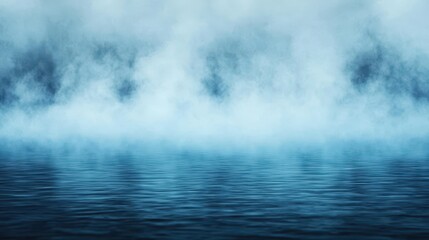 Naklejka premium Serene blue water with misty fog in the background.