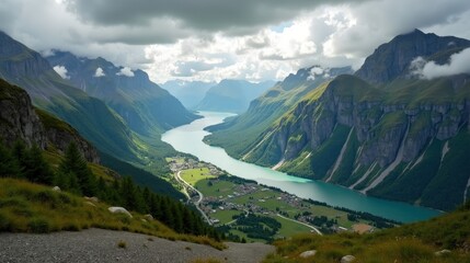 Obraz premium Romsdalen Valley's dramatic scenery seen from above on a cloudy midday, offering a broad, expansive view.