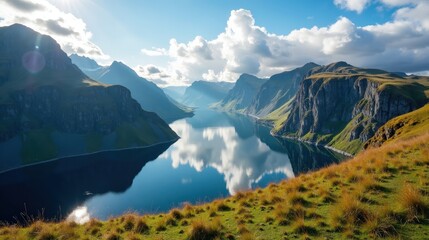 Fototapeta premium Panoramic photo of a vast Norwegian landscape under sunny midday skies, emphasizing the natural beauty.