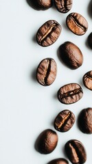 Close Up of Roasted Coffee Beans on Light Background