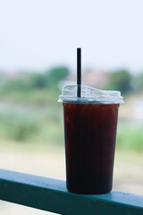 glass of cola with ice
