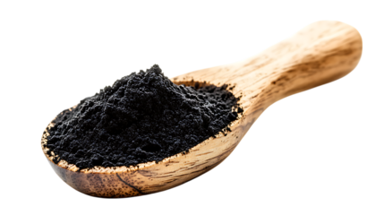 Black powder in wooden spoon on white or transparent background.