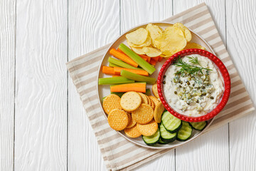 creamy yogurt pickles caper dill dip in red bowl