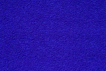 Fototapeta premium close up of blank dark blue terry wall tetxure