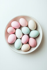Pastel Easter Eggs in Bowl - Top View Flat Lay Photography (White Background, Copy Space)