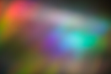 Beautiful rainbow effect on metal surface created by light coming in through a prismatic glass window in early spring 